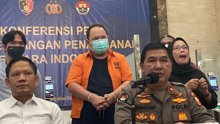 Henry Surya tersangka