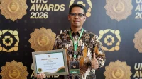 Bupati Iskandarsyah Raih Penghargaan UHC Awards