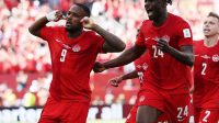 Cyle Larin merayakan gol Kanada ke gawang Bosnia-Herzegovina pada Piala Dunia 2026.