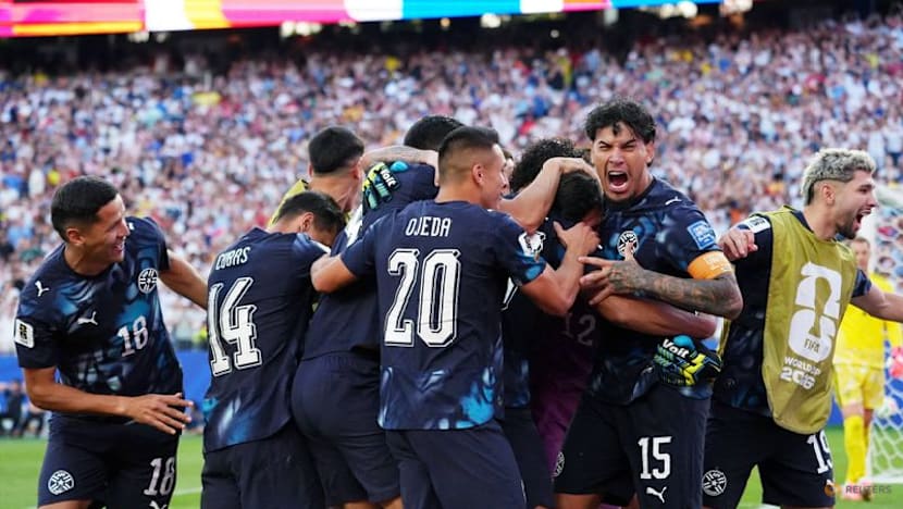 Pemain Paraguay merayakan kemenangan atas Jerman setelah adu penalti pada pertandingan Piala Dunia 2026 di Foxborough.