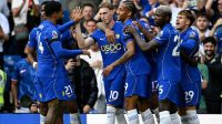 Cole Palmer merayakan gol saat Chelsea mengalahkan Brighton 4-3 di Stamford Bridge.
