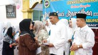 Wabup Rocky Serahkan Santunan BKMT Tebing 2025